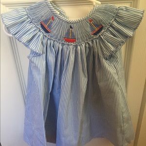 Blue smocked dress with sailboats